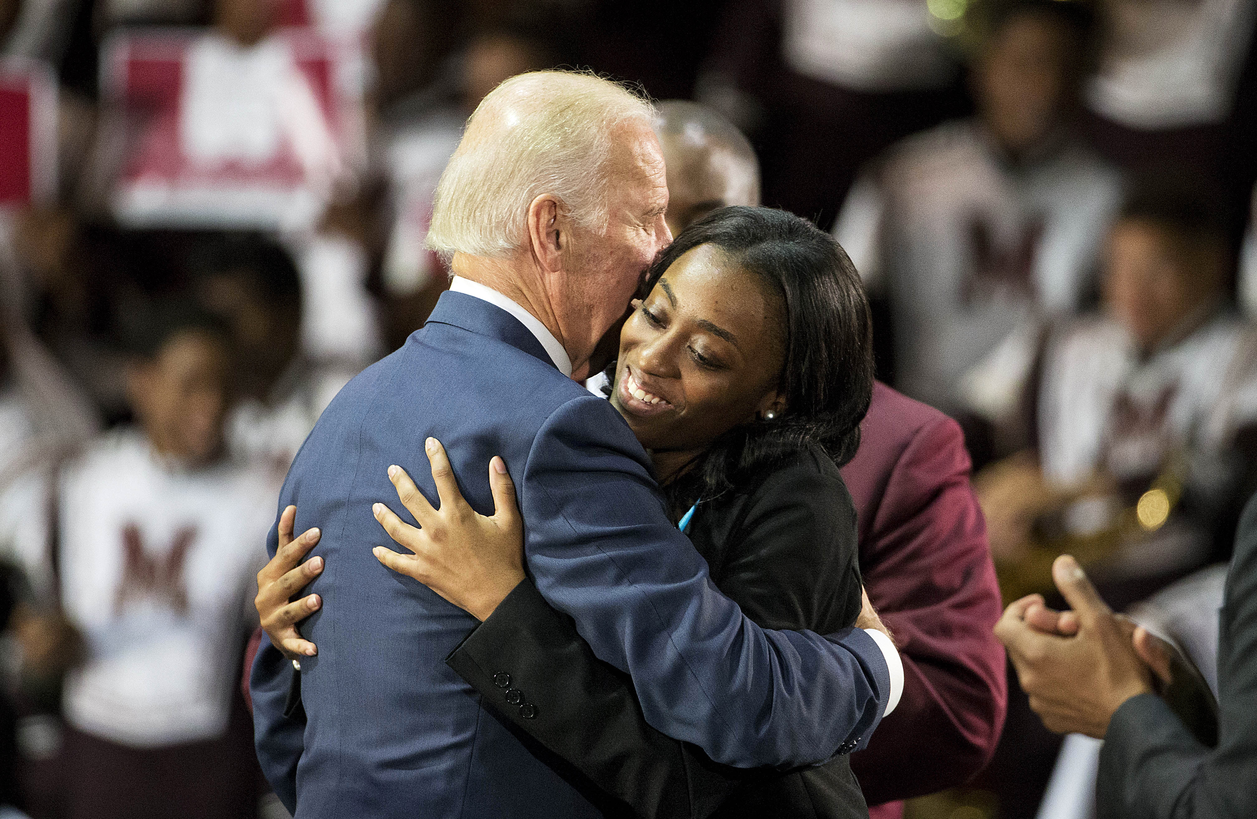 Vice President Joe Biden, left, embraces Spelman College student and sexual abuse victim Venkayla Haynes after he spoke at Morehouse College as part of a campaign to raise awareness of sexual assault on college campuses Tuesday, Nov. 10, 2015, in Atlanta. (AP Photo/David Goldman)